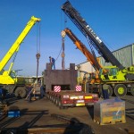 JOST Veszprém 70 tonnás présgép kitelepítése csarnokból, és trailerre daruzása 